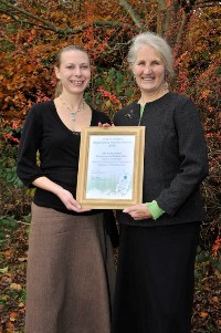 Photo caption: Environmental Quality Mark project officer Faith Johnson and Councillor Irene Ratcliffe, deputy chair of the Peak District National Park Authority, with the Responsible Tourism Awards certificate.