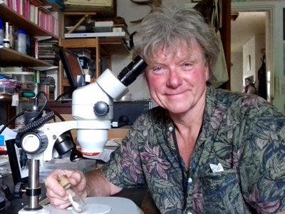 Derek Whiteley with his microscope (photo credit Phoebe Whiteley)