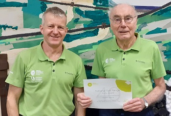 Ranger Neil Hanshaw presented volunteer Geoff Truelove with a certificate marking 40 years’ service to the Peak District National Park.