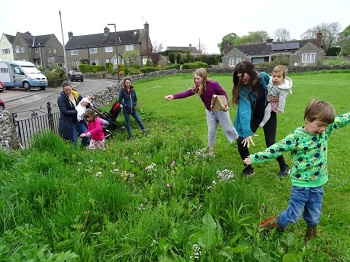 Hartington children spreading wildflower seed